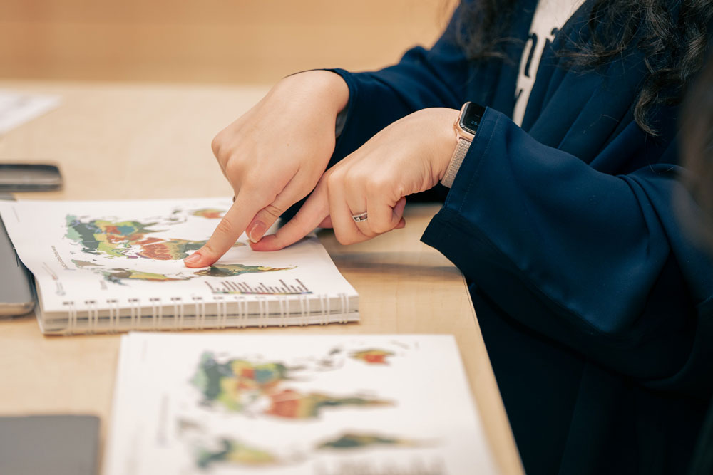 Close up of hands and a book